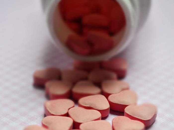 Selective-Focus Photo Of Pink Tablets