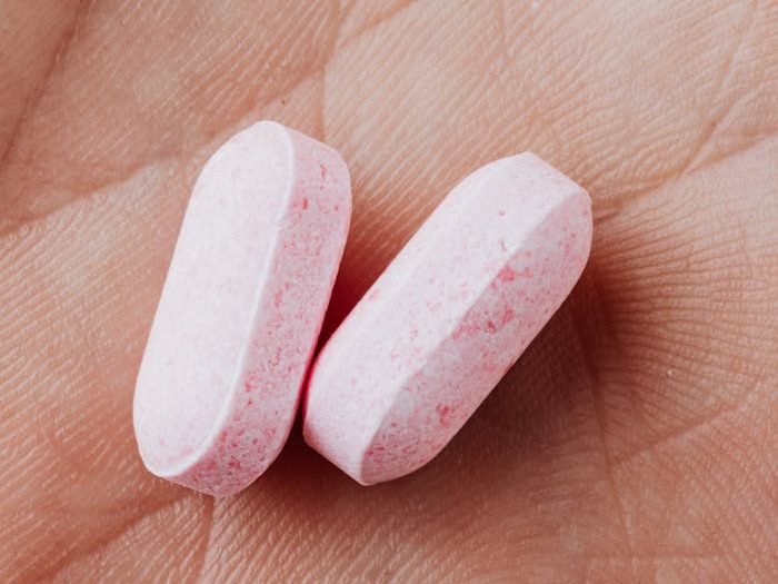 Close-up View Of Two Medicinal Tablets